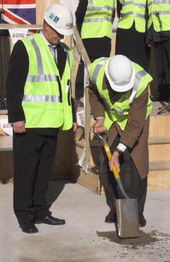 John Hood takes part in the topping out ceremony